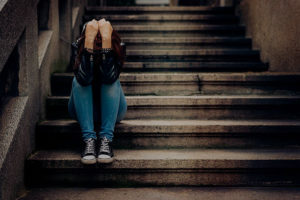 woman crying on stairs (2)