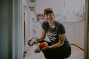 smiling women with veggies