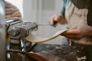 man making pasta