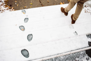 man walking in snow