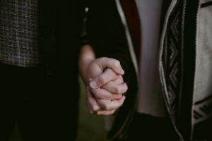 two people holding hands