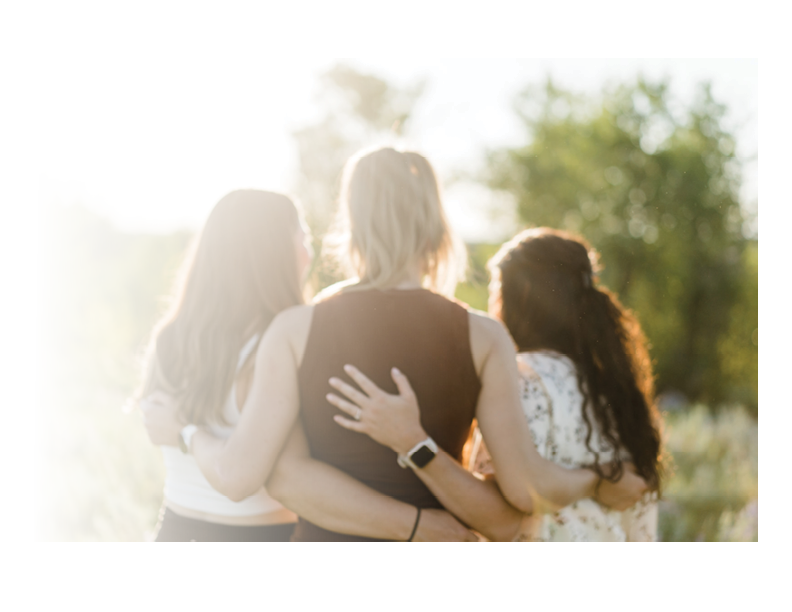 Faded picture of girls looking into the sun