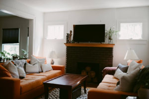 Picture of living room, fire place, and tv